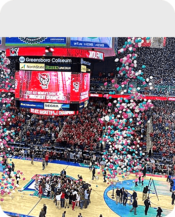 Exploding balloon and confetti on a championship game events